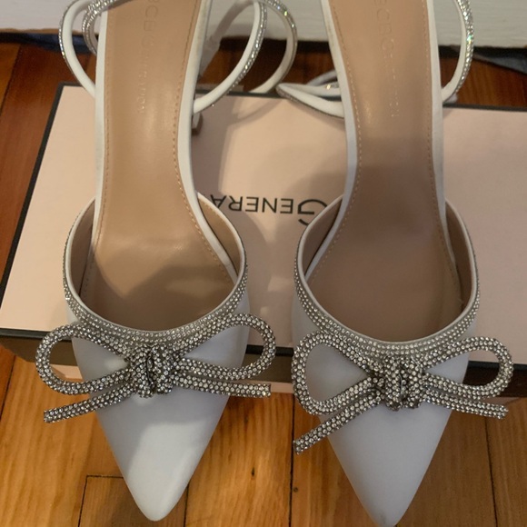 A pair of white BCBG, 1 inch heels. - Picture 6 of 6